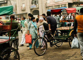 People on bicycle in city