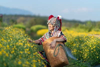 Rear view of women on field