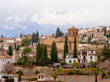 Buildings in city against sky