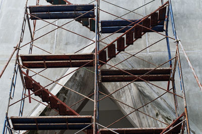 Low angle view of metal structure against sky