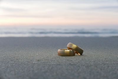 Wedding rings at beach