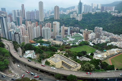 High angle view of bridge by buildings in city