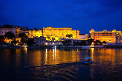 Illuminated buildings at waterfront