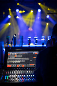 Cropped image of man using sound mixer