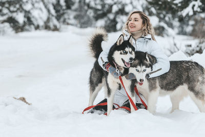 View of dog on snow covered land