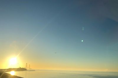 Scenic view of sea against sky at sunset