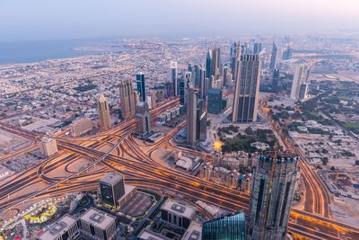 High angle view of street amidst buildings in city