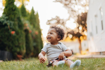 Cute baby girl looking away