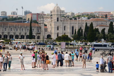 Group of people in front of historical building