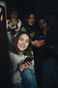 Young woman using mobile phone