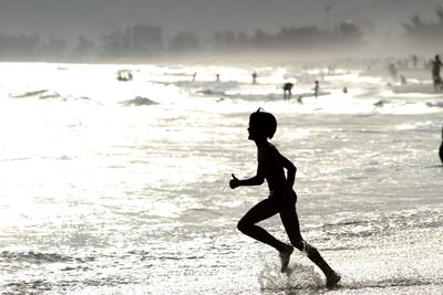Woman standing in water
