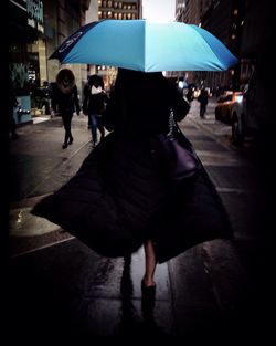 Woman standing in city