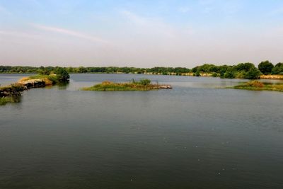 Scenic view of lake against sky