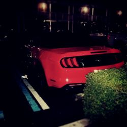 Close-up of car on road at night