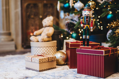 Stuffed toy on table at home during winter