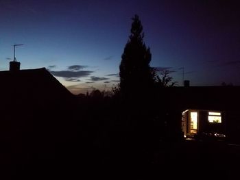 Silhouette of house at night