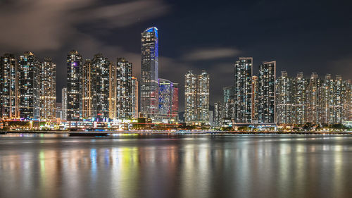 Illuminated buildings in city at night