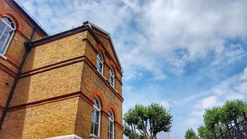 Low angle view of old building against sky