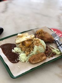 High angle view of breakfast served on table