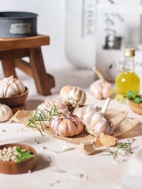 Garlic blub with rosemary, olive oil, pepper and various herbs