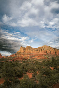 Sunset view of red rock buttes and formations within sedona arizona usa against white cloud. 