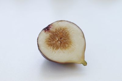 High angle view of apple against white background