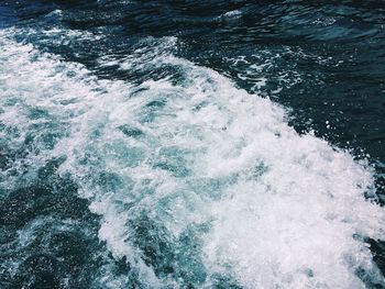 Close-up of wave splashing on water