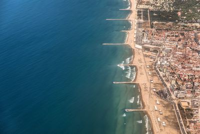 High angle view of ship sailing in sea