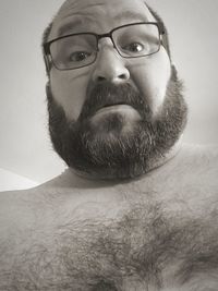 Portrait of man wearing eyeglasses