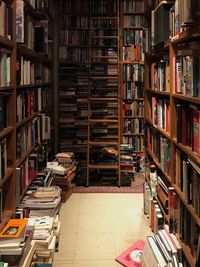 Books in shelves at library