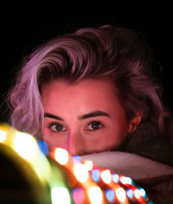 Portrait of beautiful woman with light painting