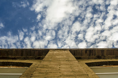 Low angle view of steps against sky