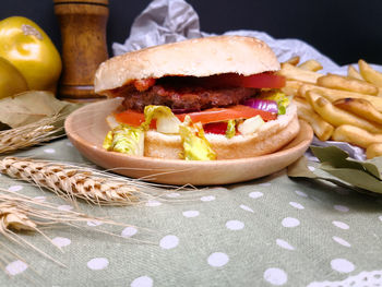 Close-up of burger in basket on table