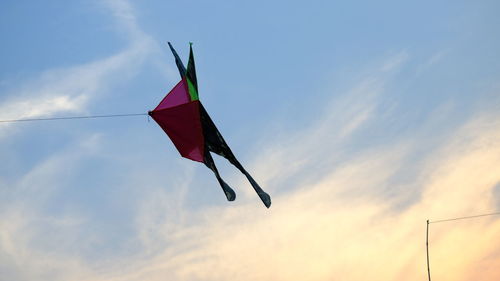 Low angle view of flag against sky