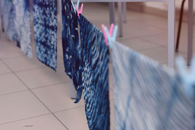 High angle view of clothes hanging on floor in building