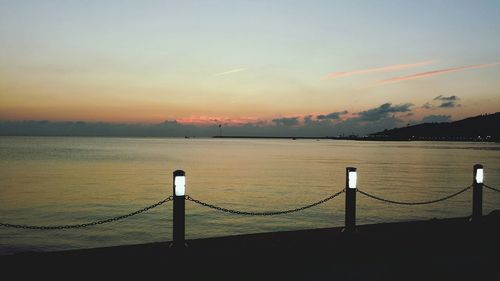 Scenic view of sea at sunset