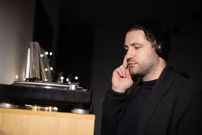 Portrait of young man using mobile phone