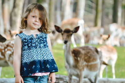 Portrait of girl standing outdoors