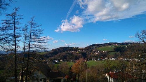 Scenic view of landscape against cloudy sky