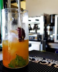 Close-up of drink on glass table