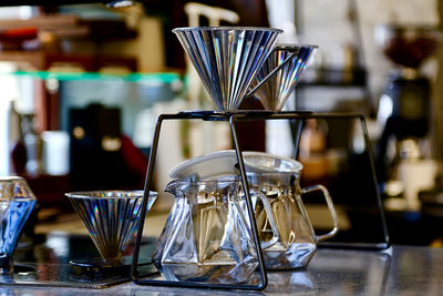 Close-up of glasses on table