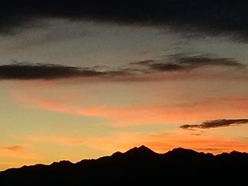 Scenic view of mountains at sunset