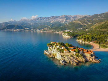 Scenic view of sea against blue sky