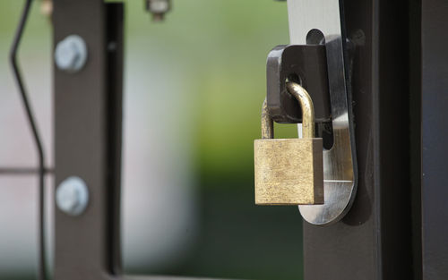 Close-up of padlock on door