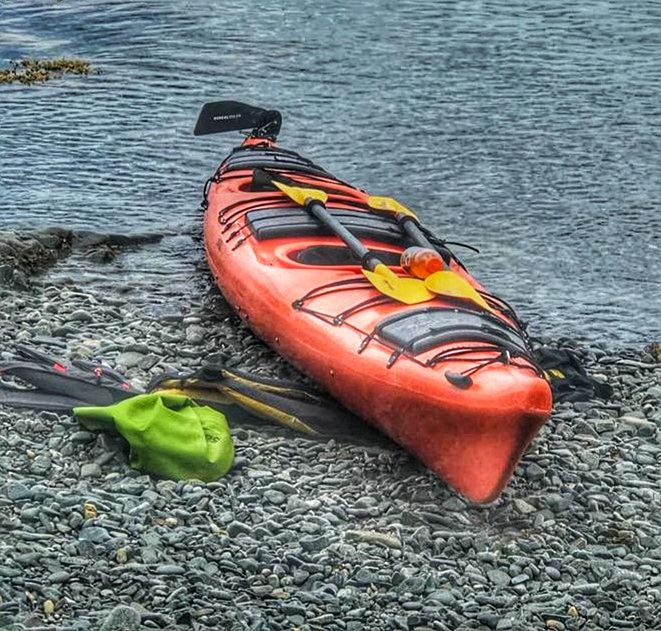 water, boat, sports equipment, high angle view, nature, day, boating, transportation, vehicle, kayak, no people, nautical vessel, outdoors, watercraft, sea kayak, beach, sports, paddle, kayaking, sea, mode of transportation, orange color