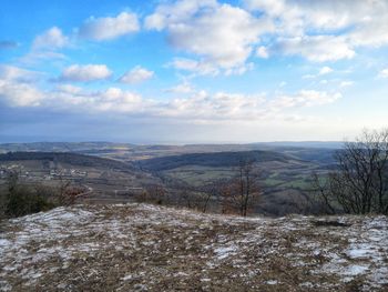 Scenic view of landscape against sky during winter