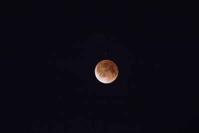 Moon against clear sky at night