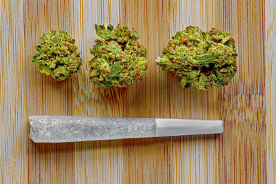 High angle view of vegetables on cutting board