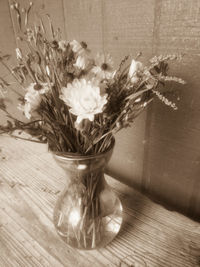 Close-up of flower vase on table