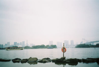 View of river with buildings in background